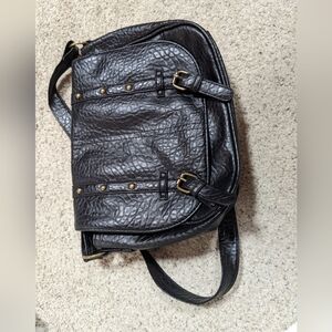 Faux leather crossbody bag. black inner pockets medium size